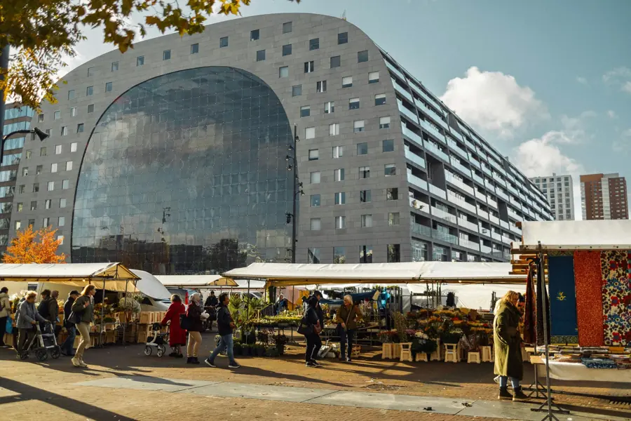 The Markthal in Rotterdam with a market in front
